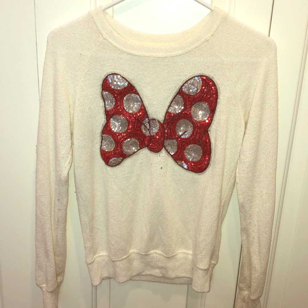 A Sweater with a Minnie mouse bow